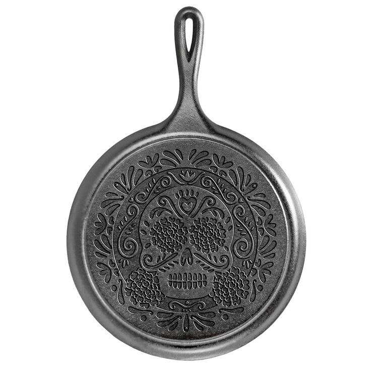 Lodge Cast Iron Comal con Diseño de Calaveras Mexicanas — Imagen 1 de 4